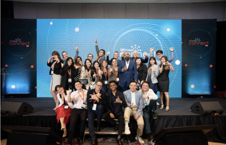 Crayon Connect team group photo on stage