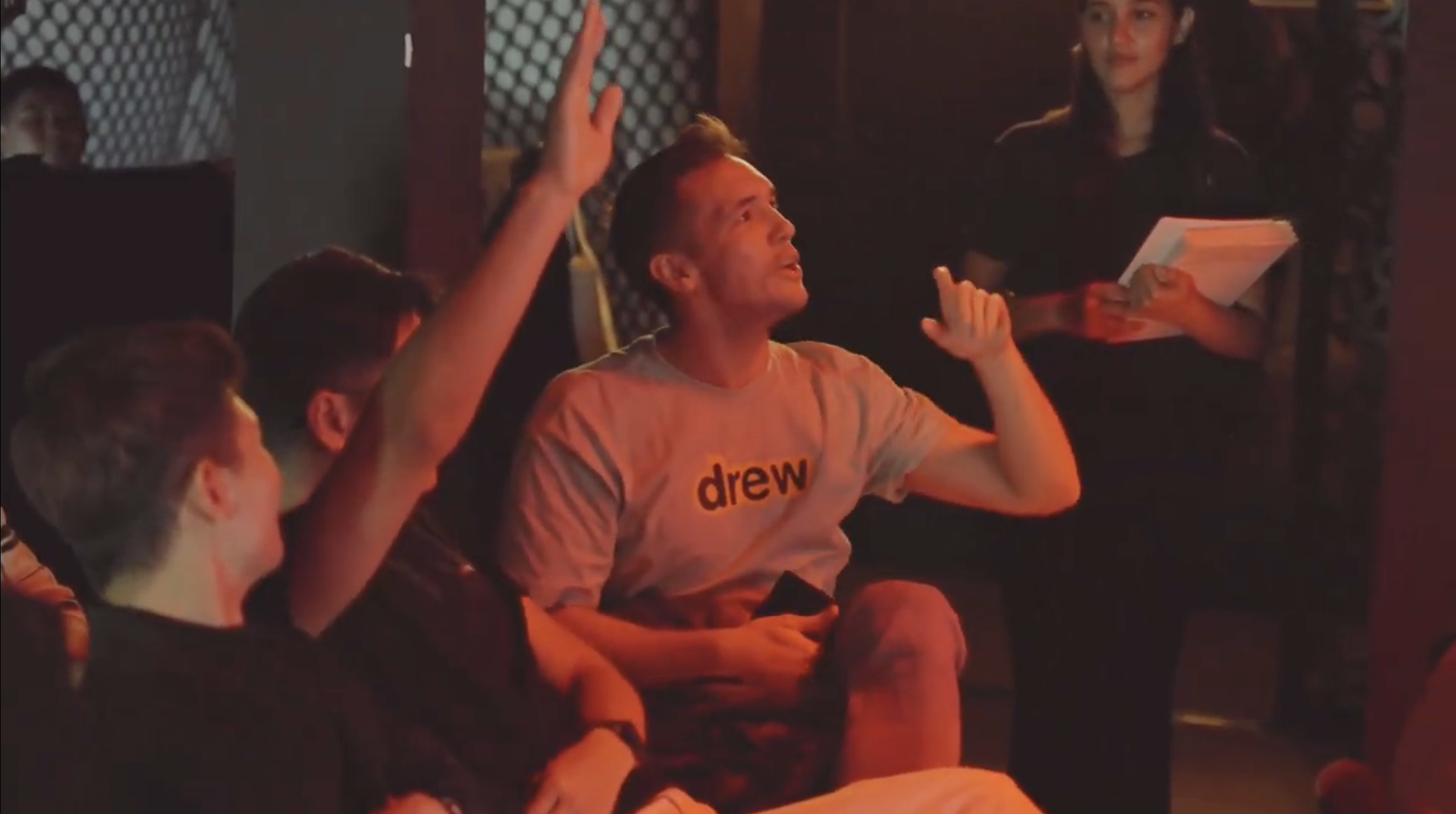 Fans raising hands during the Q&A