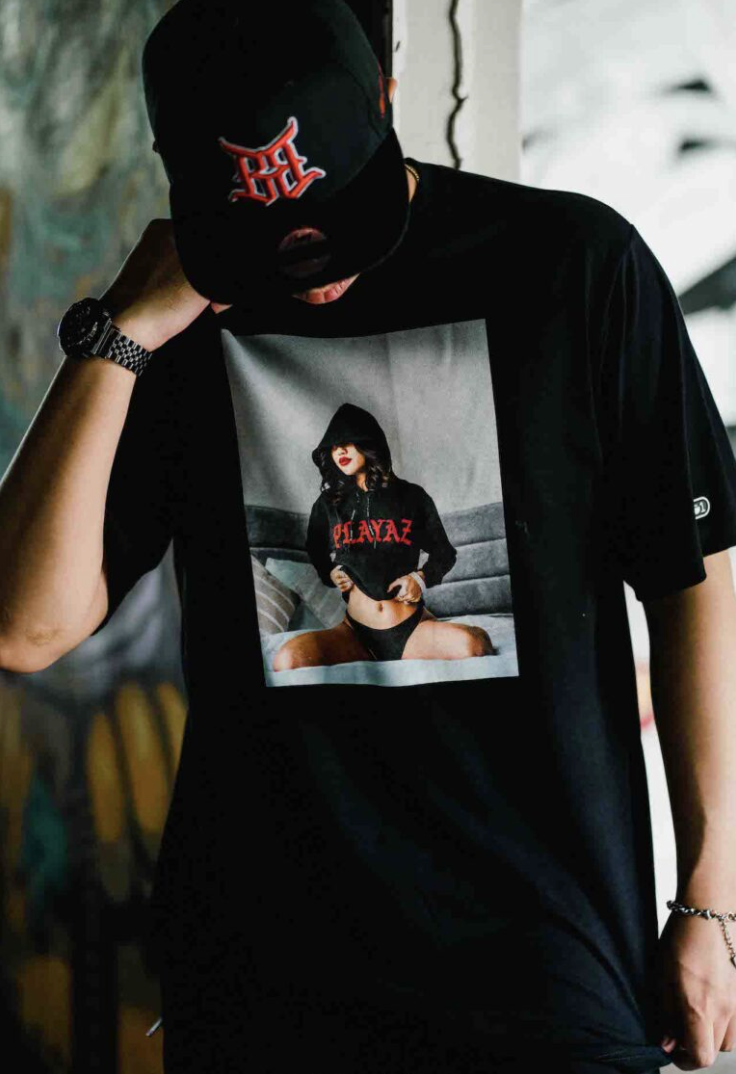 Close-up of a Playaz graphic tee
