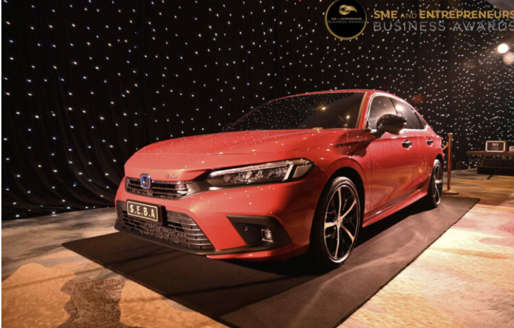 Red Honda Civic prize car on display